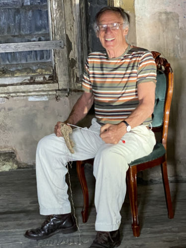 David Jordan on green chair